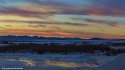 Colorful Sunset Over A Frozen Bend In The Green River. Photo by Dave Bell.