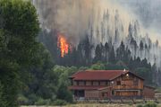 Burning Next To A Barn. Photo by Dave Bell.