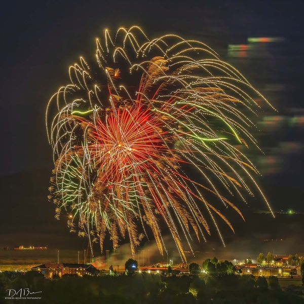 Fireworks and Flags. Photo by Dave Bell.