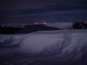 Drifted Snow Captures Moonlight. Photo by Dave Bell.