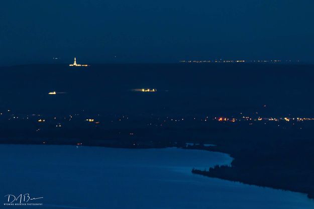 South End Of Fremont Lake, PEP Rig, Lights of Pinedale and Big Piney. Photo by Dave Bell.