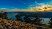 Sunsetting Sun And Fremont Lake. Photo by Dave Bell.