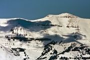 Cloud Shadow On The Sawtooth. Photo by Dave Bell.