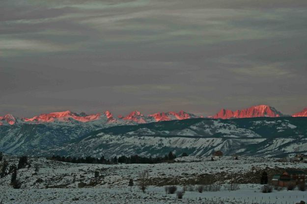Red Sunset Light On Peaks. Photo by Dave Bell.