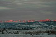 Red Sunset Light On Peaks. Photo by Dave Bell.