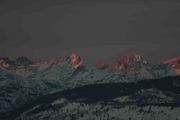 Northern Range Peaks Catch Last Light. Photo by Dave Bell.