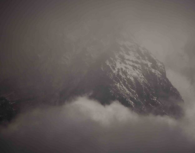 Tetons In The Clouds. Photo by Dave Bell.