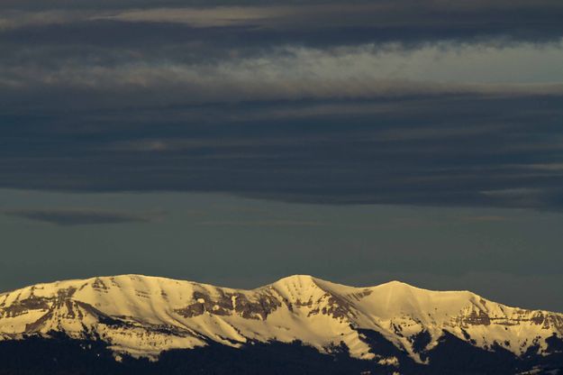 Morning Light On Triple Peak. Photo by Dave Bell.