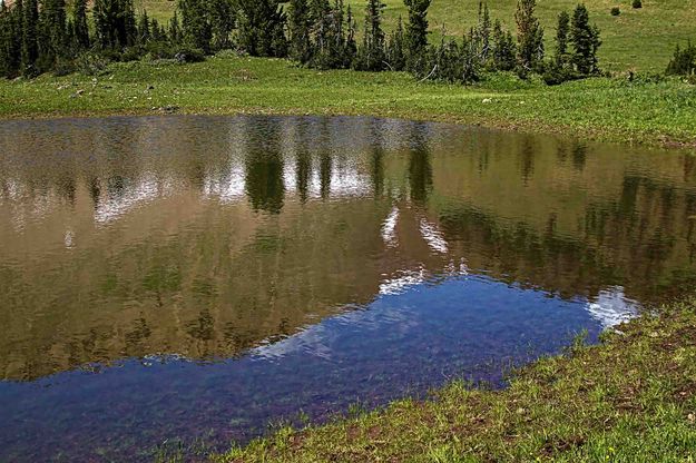 Small Reflective Tarn. Photo by Dave Bell.