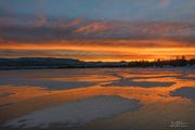 Sunrise On The Ice. Photo by Dave Bell.