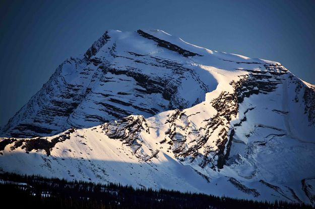 View Of Longfellow Peak From Going To Sun Highway At Sunset. Photo by Dave Bell.