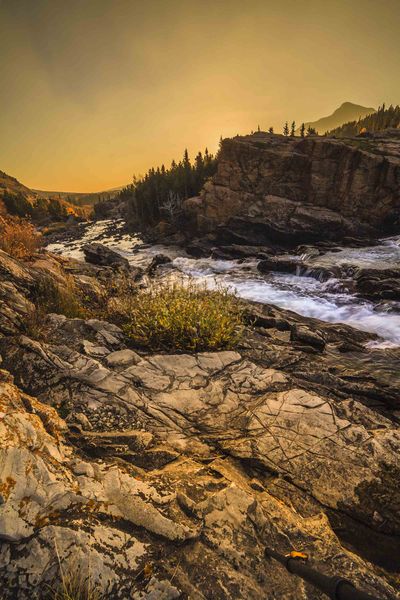 Sunrise On Swiftcurrent Falls. Photo by Dave Bell.