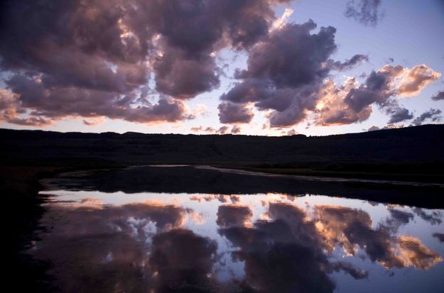 Cloud Reflection In The Green River. Photo by Dave Bell.