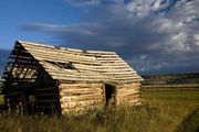 Sunrise Light On Old Building. Photo by Dave Bell.