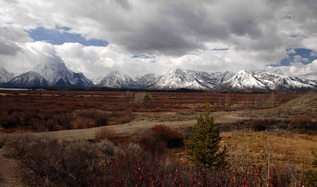 Snowshowers Over Tetons. Photo by Dave Bell.