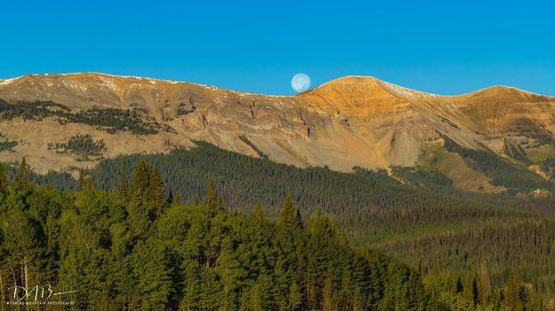 Setting On The Shoulder Of Triple Peak. Photo by Dave Bell.