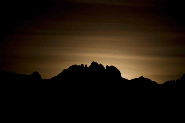 Moon Glow Behind Mt. Bonneville. Photo by Dave Bell.