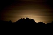 Moon Glow Behind Mt. Bonneville. Photo by Dave Bell.