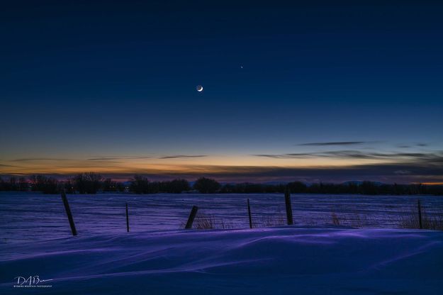 Moon And Jupiter. Photo by Dave Bell.