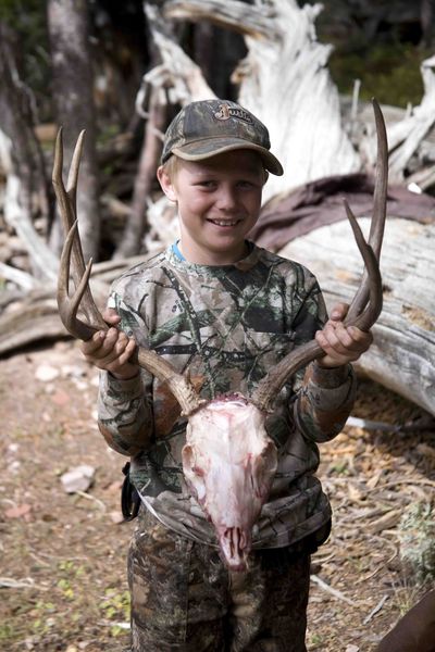 12-Year Old Lott Broadbent--First Deer. Photo by Dave Bell.
