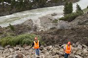 Rock Pile To The River--WyDOT Geologists Mark Faulk And Kirk Hood. Photo by Dave Bell.