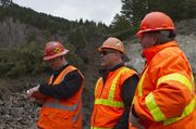Pinedale Engineers Bob Maxam and Pete Hallsten Review Notes With Geologist Kirk Hood. Photo by Dave Bell.