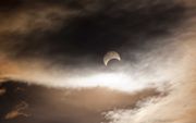 Eclipse Progresses. Photo by Dave Bell.