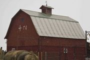 Snowflakes At The Cross Lazy Two Barn. Photo by Dave Bell.