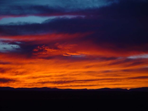 Sunset Silouettes The Wyoming Range On October 19, 2003, North Of Big Piney. Photo by Dave Bell.