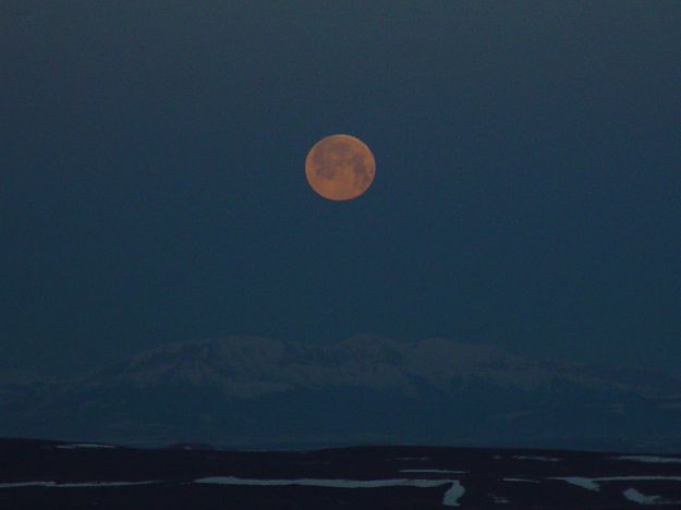 Full Moon Setting Over Wyoming Range. Photo by Dave Bell.