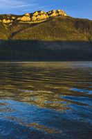 Sunset Light On Charlotte Peak Above Big Salmon Lake. Photo by Dave Bell.