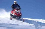 Dave On Sled.  Photo Courtesy Arnie. Photo by Dave Bell.