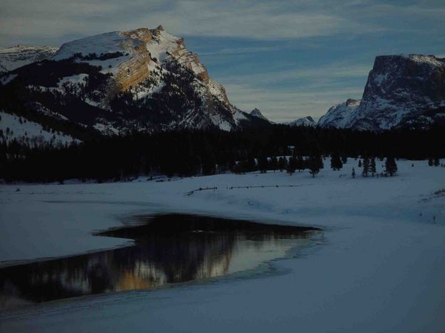 Reflection In Nearly Frozen Green River. Photo by Dave Bell.