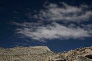 Puffy Clouds Over Wind River Peak Summit. Photo by Dave Bell.