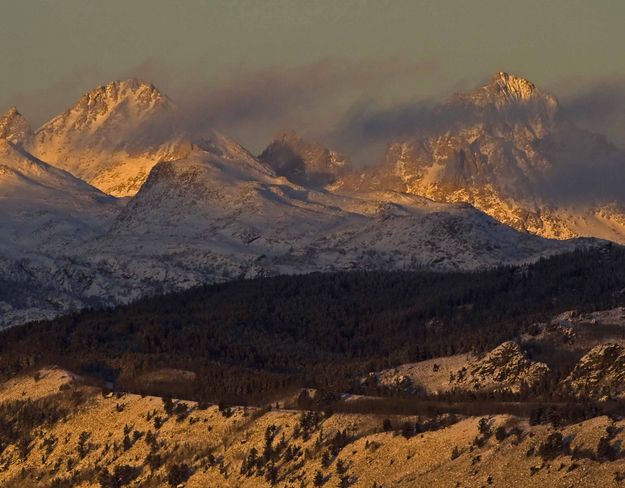 Sunset On Peaks With Clouds. Photo by Dave Bell.