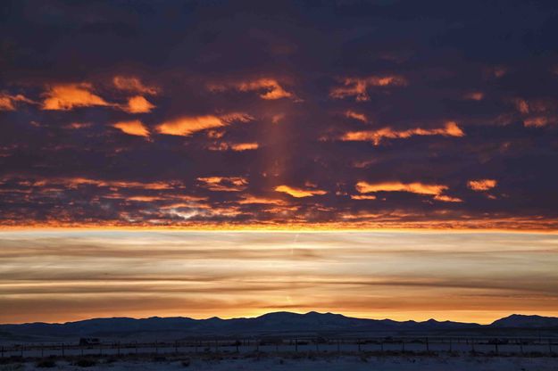 Sunset Over Silhouetted Wyoming Range. Photo by Dave Bell.