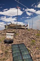 Using The Sun--Forest Service Fire Communication Antennas. Photo by Dave Bell.