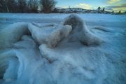 Sandy Beach Ice Sculptures And Icy Beauty