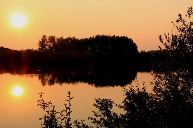 8/12/2012 - Fish Pond Sunset. Photo by Fred Pflughoft.