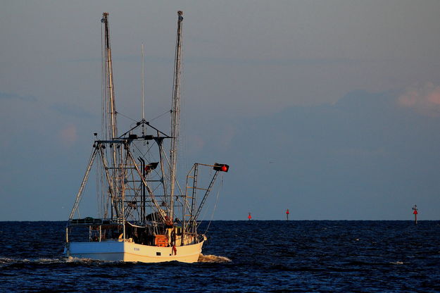 Shrimp Boat Heading Out in to the Gulf _ Gulfport, Mississippi. Photo by Fred Pflughoft.