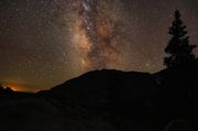 The Milky Way and lights of Rock Springs - Photo courtesy of Kit Pflughoft. Photo by Fred Pflughoft.