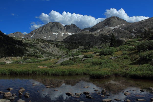 Lester Peak reflected in tarn. Photo by Fred Pflughoft.