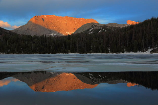 Haystack Mtn. reflected in Big Sandy Lk.. Photo by Fred Pflughoft.