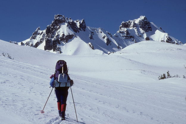 Sue traversing backside of Broken Top / Broken Top Ski Traverse / Oregon / circa 1988. Photo by Fred Pflughoft.