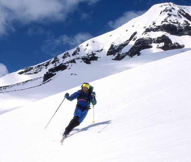 Fred carving tele-turns on the Hayden Glacier / Three Sisters Wilderness Backcountry Ski / Oregon / circa 1989. Photo by Fred Pflughoft.