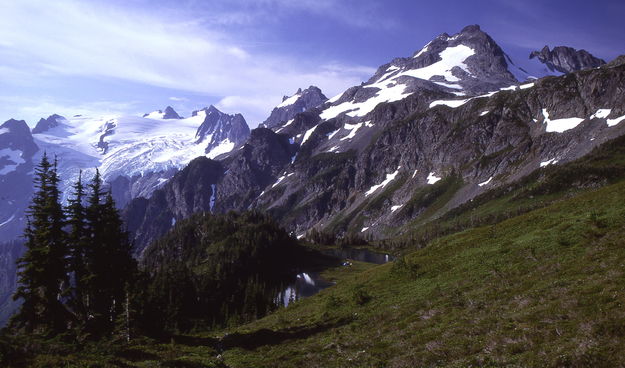 Our camp at Yang Yang Lks. / We climbed the peak on the right skyline the day after this picture was taken / Ptarmigan Traverse / Washington / circa 1985. Photo by Fred Pflughoft.