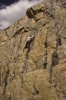 Sue top-rope climbing near Elbow Lk. / Wind River Mtns. / Wyoming / circa 1988. Photo by Fred Pflughoft.