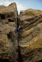 Sue on the Owen-Spalding Rappel / Grand Teton / Wyoming / circa 1988. Photo by Fred Pflughoft.