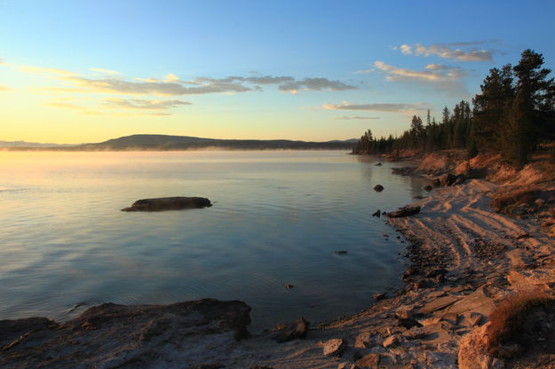 Sunrise at West Thumb Geyser Basin. Photo by Fred Pflughoft.