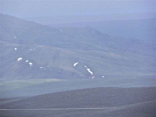 Hills turning green from brown in May near Fremont Butte.. Photo by Scott Almdale.